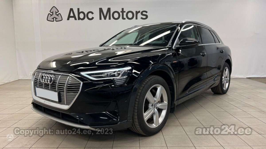 Black Audi e-tron in showroom